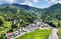 杨之久是贵阳市税务局派驻修文县六屯镇